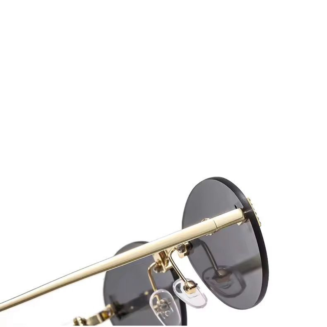 EGLE - Sonnenbrille mit goldenen Rahmen und farbigen Gläsern